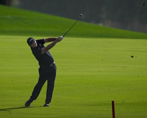 Patrick Reed Stays Ahead in Dubai, Ignores Fines