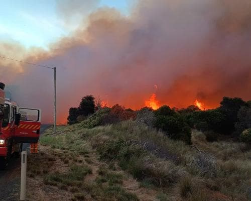 Sydney Hits Record Heat While Tasmania Faces Bushfires